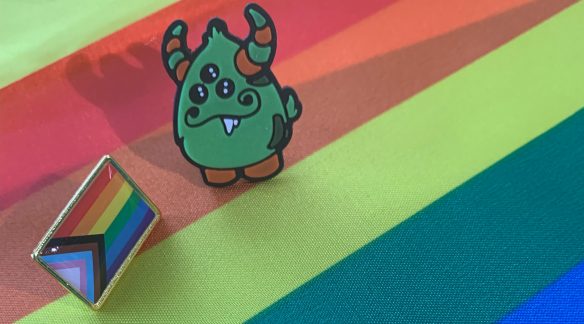 3i Monster and Pride flag pins.