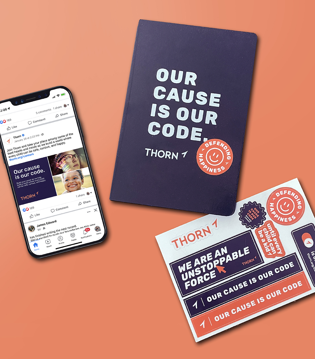 A collection of Thorn items, including a smartphone showing Thorn social media posts, a pamphlet with “Our Cause Is Our Code.” on the front cover, and a sticker sheet.