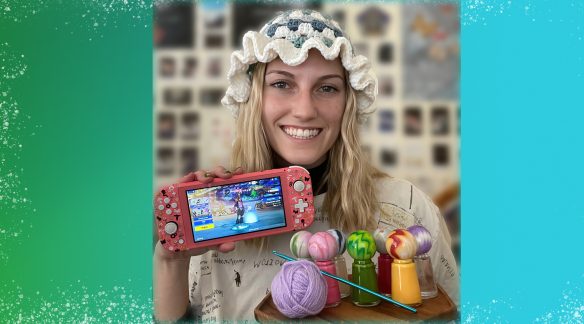 Image of Andrea with her crochet projects and gaming console.