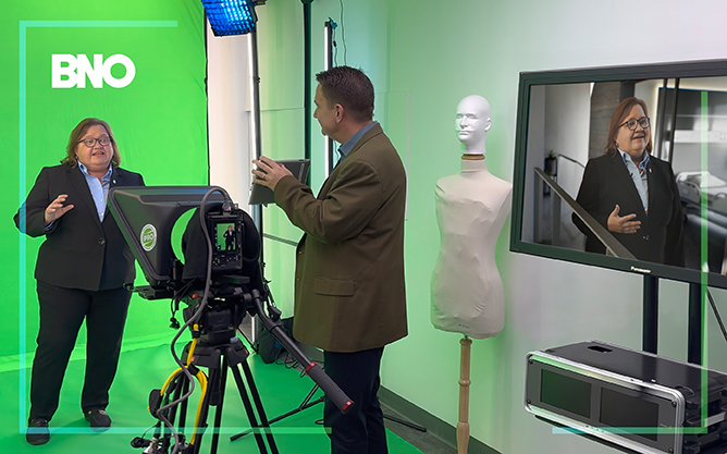 George, right, directing in the Virtual Studio.