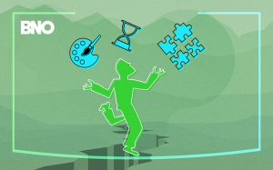 A man walking on a tightrope, balancing his creativity in the form of icons.